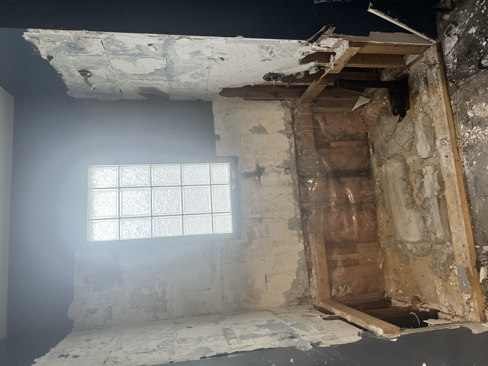 Kitchen wall opened to the studs during a renovation