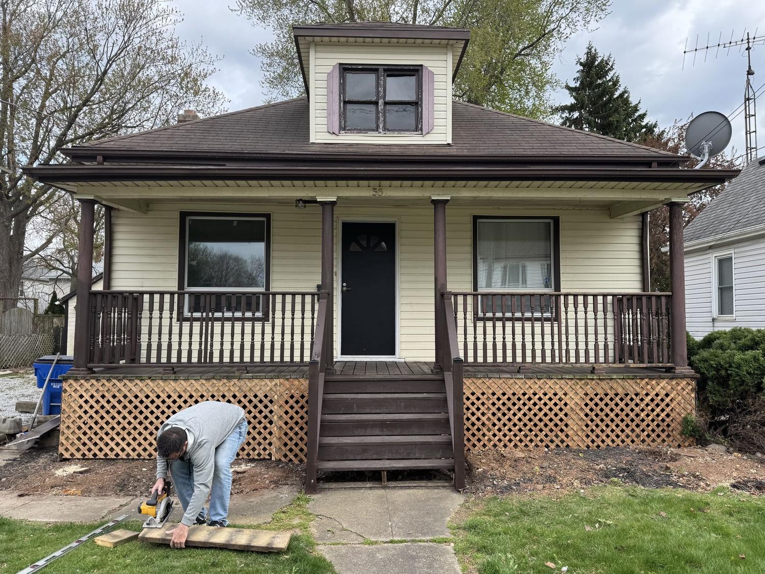 Cactus Capital crew working on the front walk of a Chatham renovation